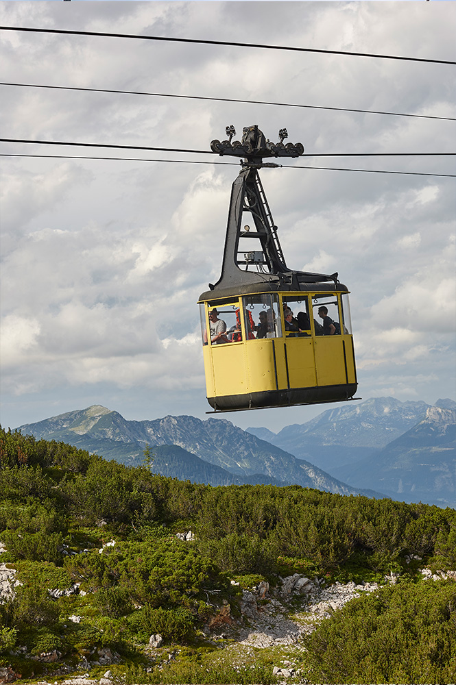 Scenic cable car ride with breathtaking views of the Swiss Alps.