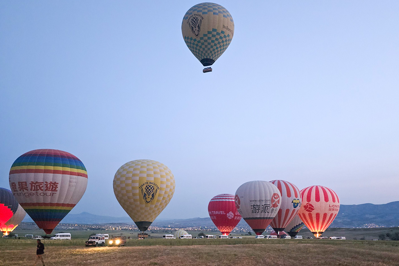 Hot air balloons soaring over Cappadocia, Turkey.
