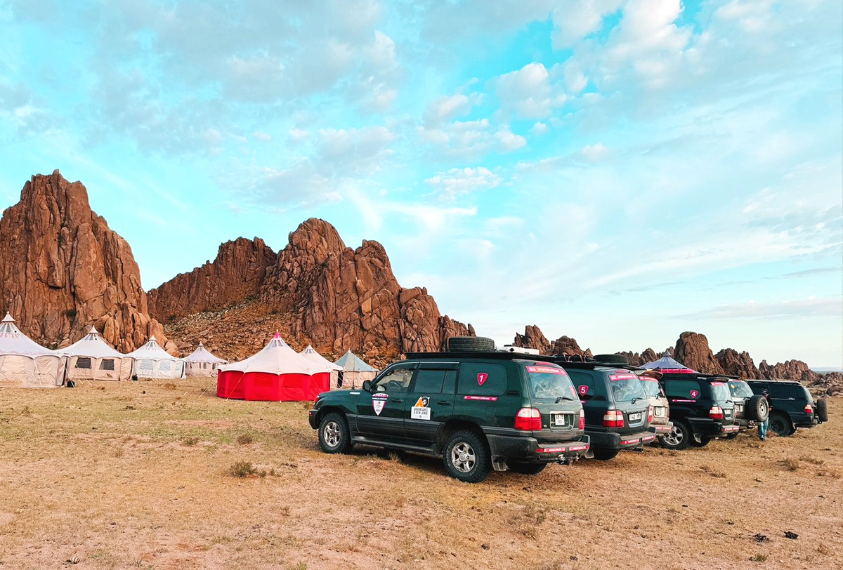 4x4 SUVs at a luxury ger camp in Mongolia.