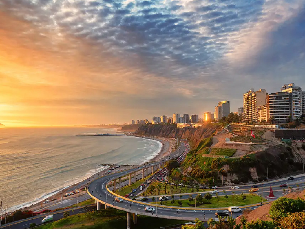 Sunset over the Malecón and Pacific coastline in Lima's Miraflores district